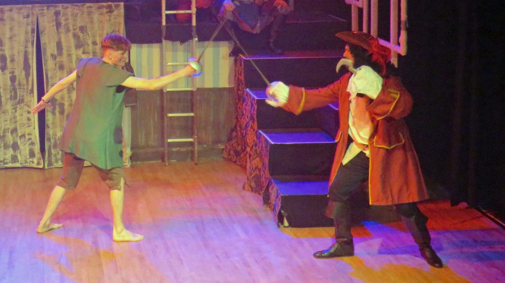 Pan and Hook cross swords